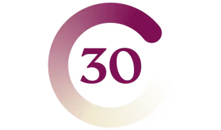 30 omgivet af en cirkel af lilla blommesand.