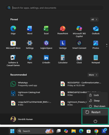 Windows Start menu with the Power options dialog open and the Restart option highlighted.